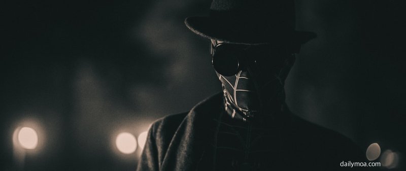 영화관 스크린과 관람객 실루엣 이미지